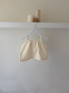 Soft dotted muslin baby top