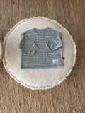 Striped light sweater