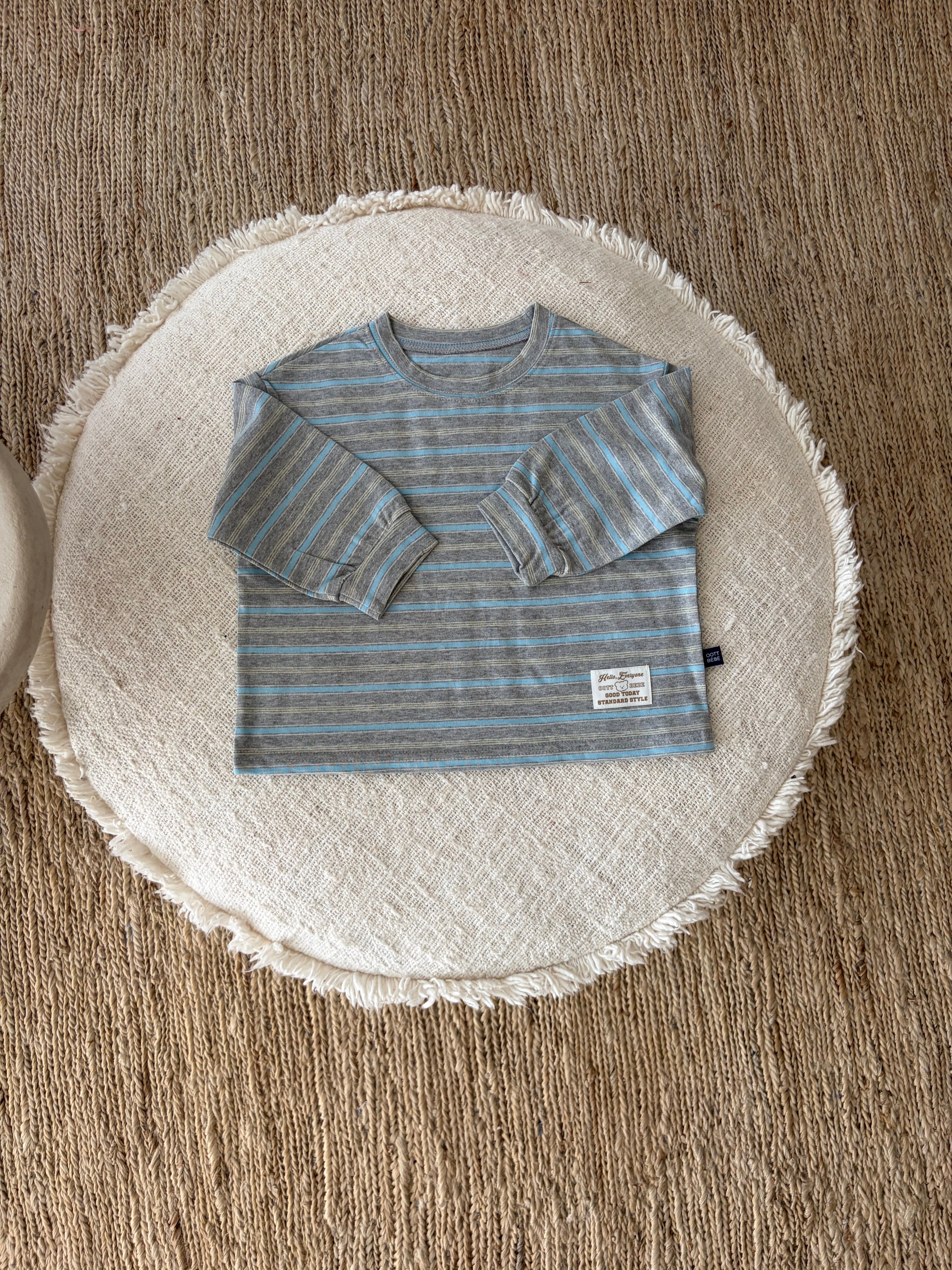 Striped light sweater